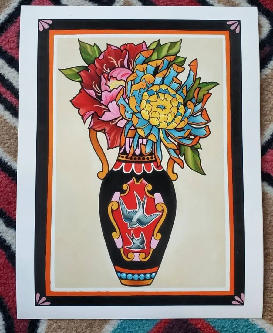Colorful illustration of a vase with intricate patterns, holding large pink and red flowers with green leaves