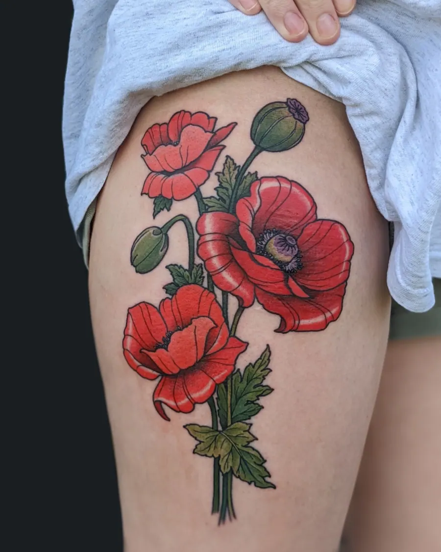 Colorful tattoo of red poppies with green leaves and seed pods on the thigh by English Cousins, Nashville